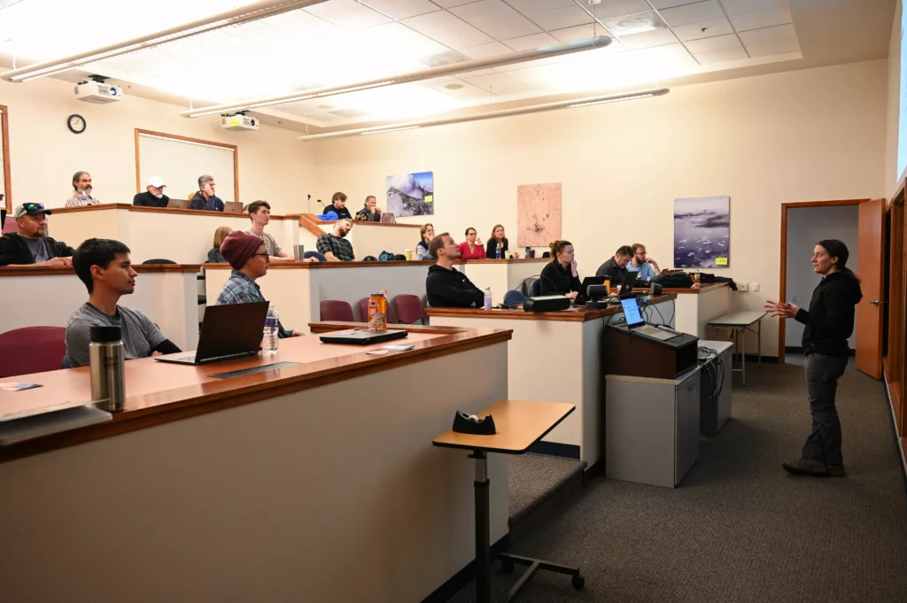 staff listening to presenter in a classroom