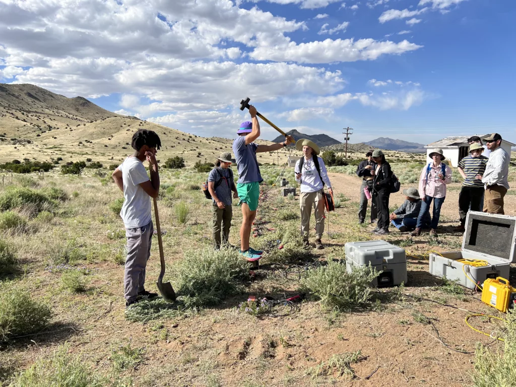 URISE intern Jackson Fellows in the field.