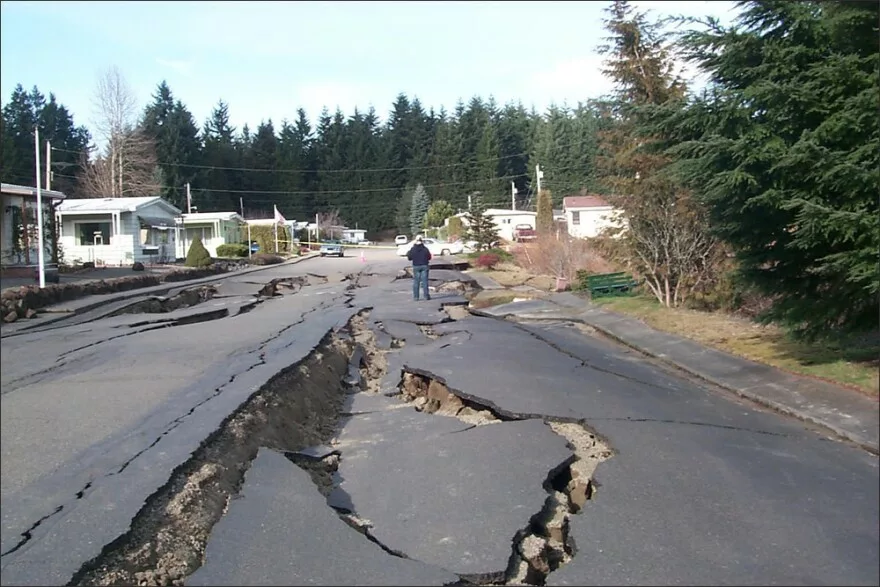 Road damage due to liquefaction from the 2001 Nisqually Earthquake in Thurston County, Washington.