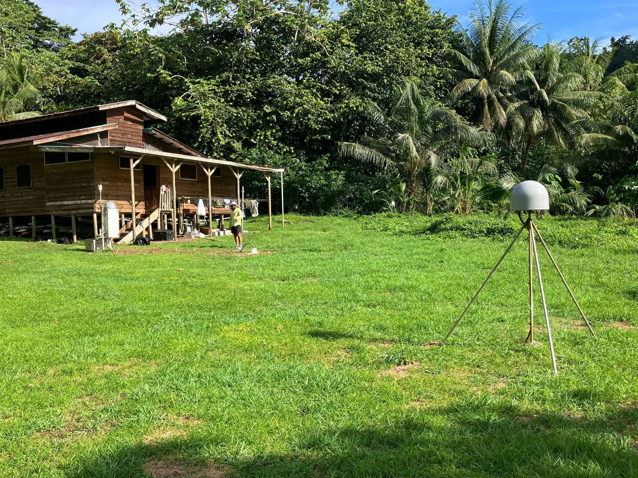 Image of ISCO station on Cocos Island. The GPS station is in the foreground, with the tower containing all the additional instrumentation and power supply in the background. 