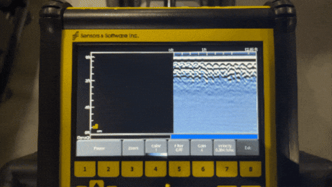 A GIF showing a real-time readout of a GPR radargram as the GPR is pushed over a warehouse floor.