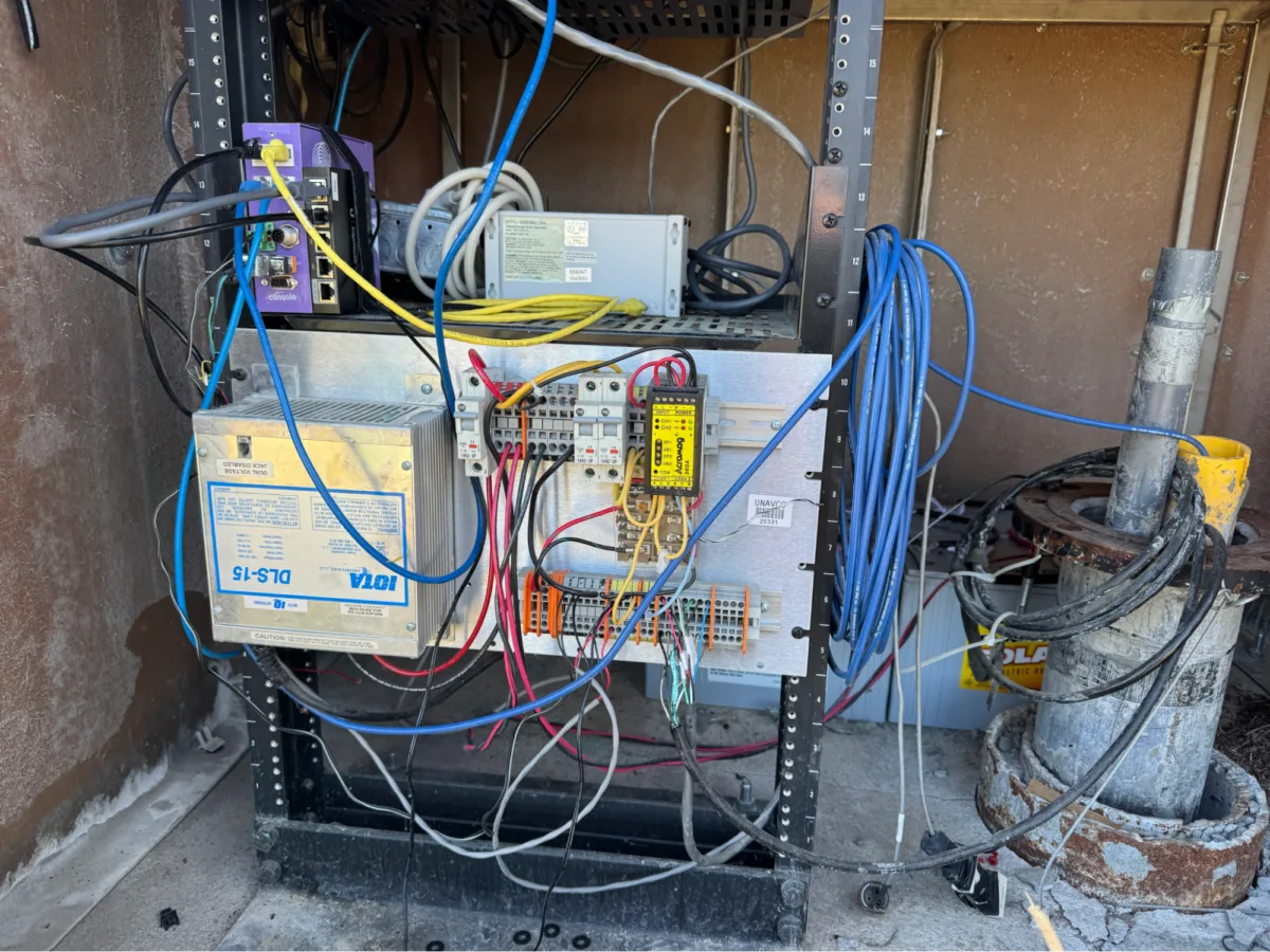 Cables and connected components inside the borehole station.